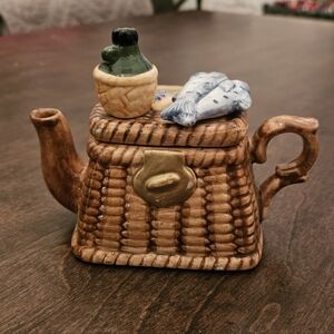 Ceramic Fishing Basket Teapot by World Bazaar Inc.